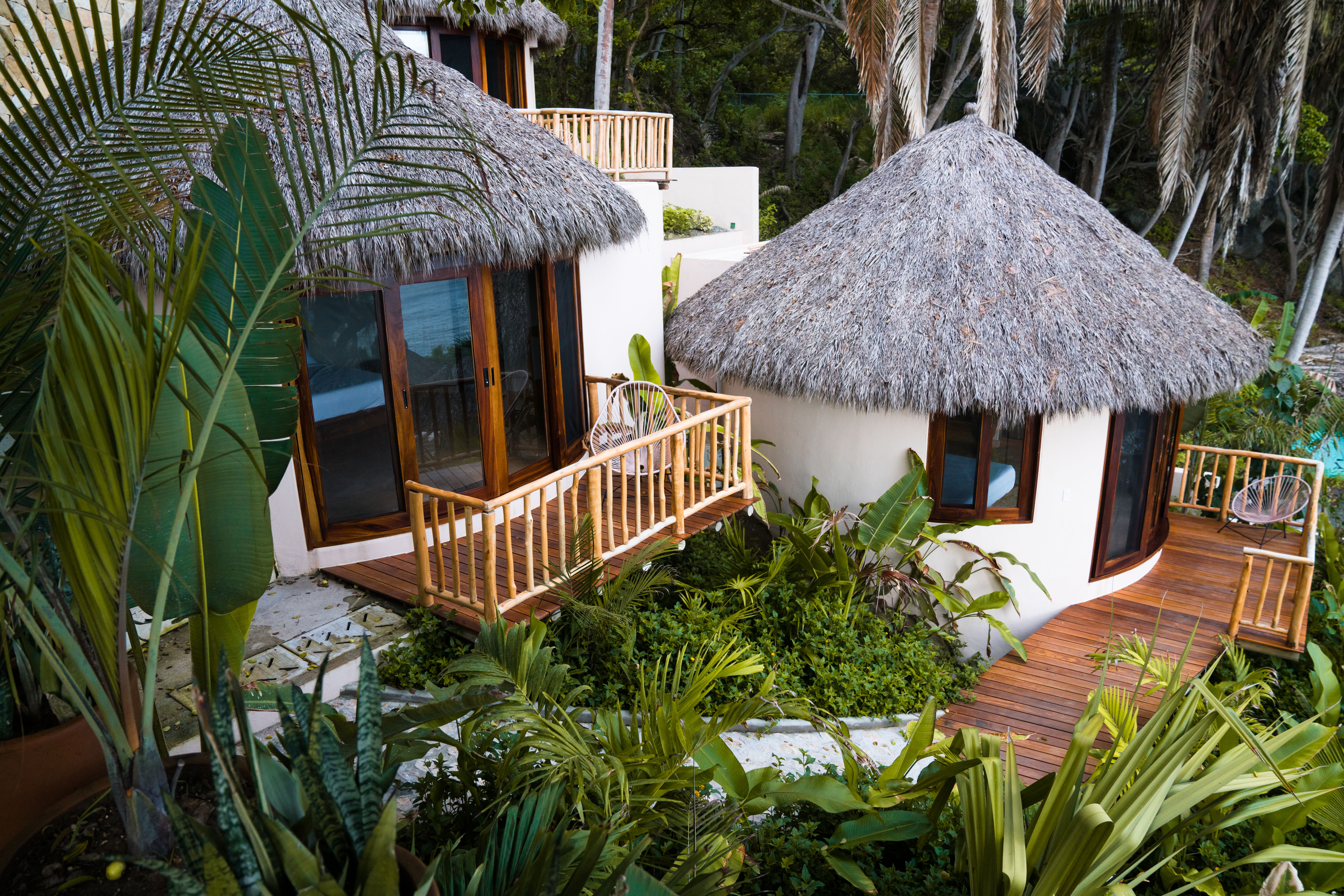 Aerial view of La Joya bungalows nestled in tropical gardens